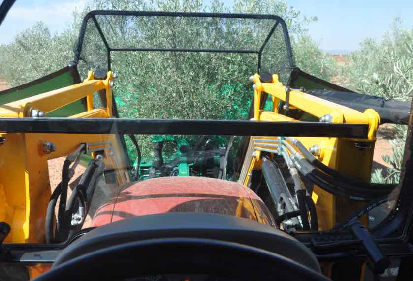 Image of vibrator with PG harvester from inside tractor